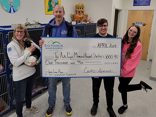 BHBT employees present a donation to Ark Pope Memorial Animal Shelter