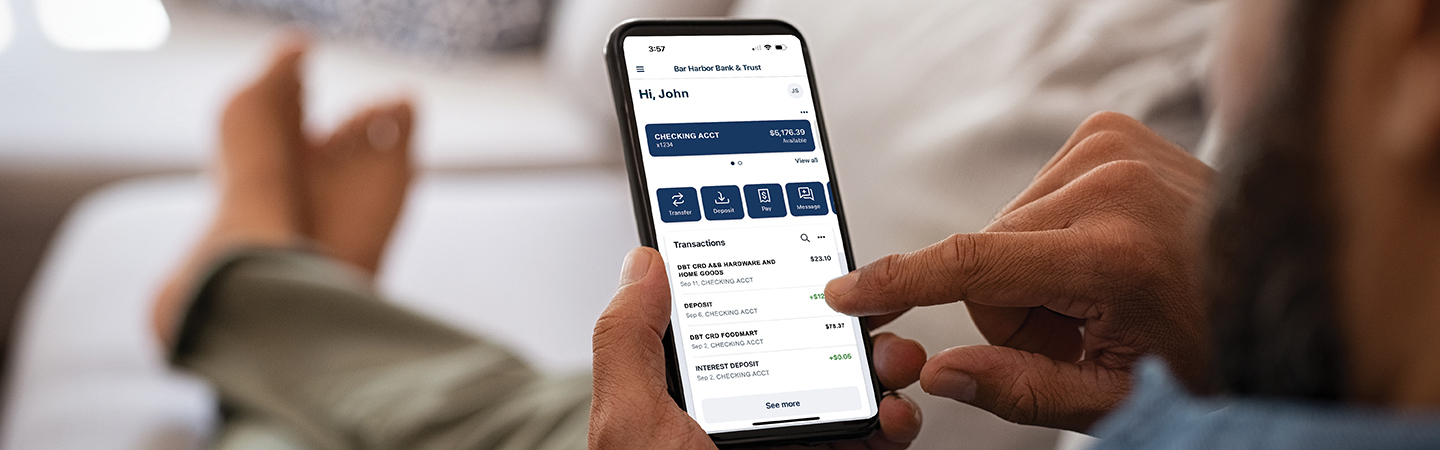Man looking at Bar Harbor Online on his mobile phone