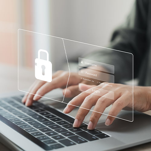 A woman typing on a laptop with a graphic of a secure login screen