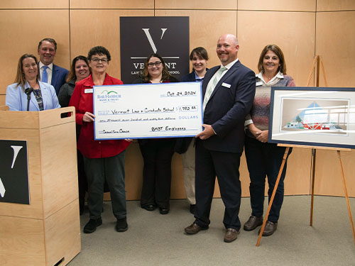 BHBT employees present a donation to Vermont Law and Graduate School